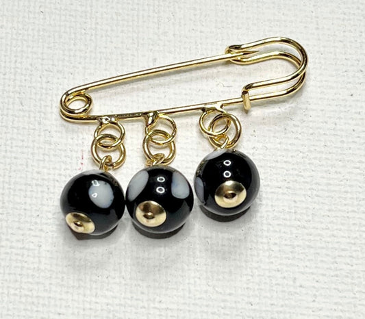 Why do Cape Verdean babies often wear Conta di Ojo?