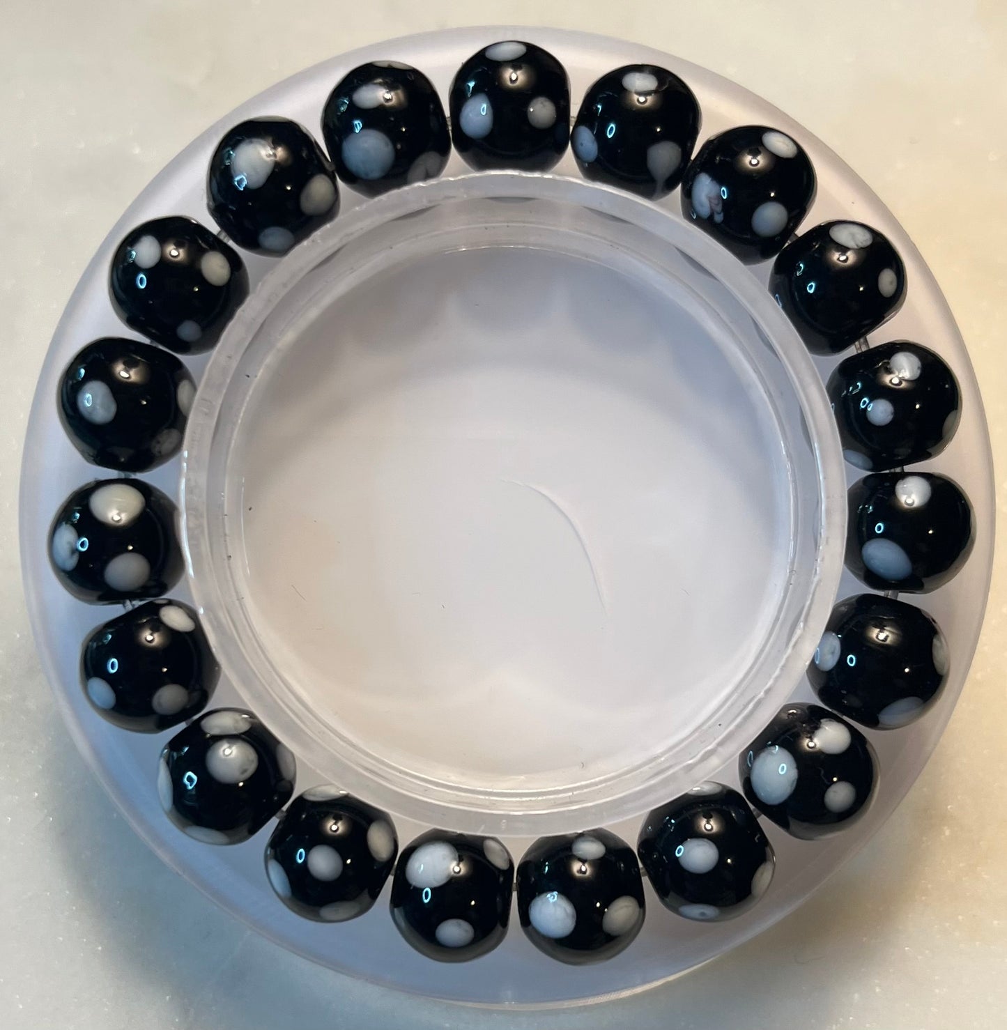 Conta di Ojo Beads