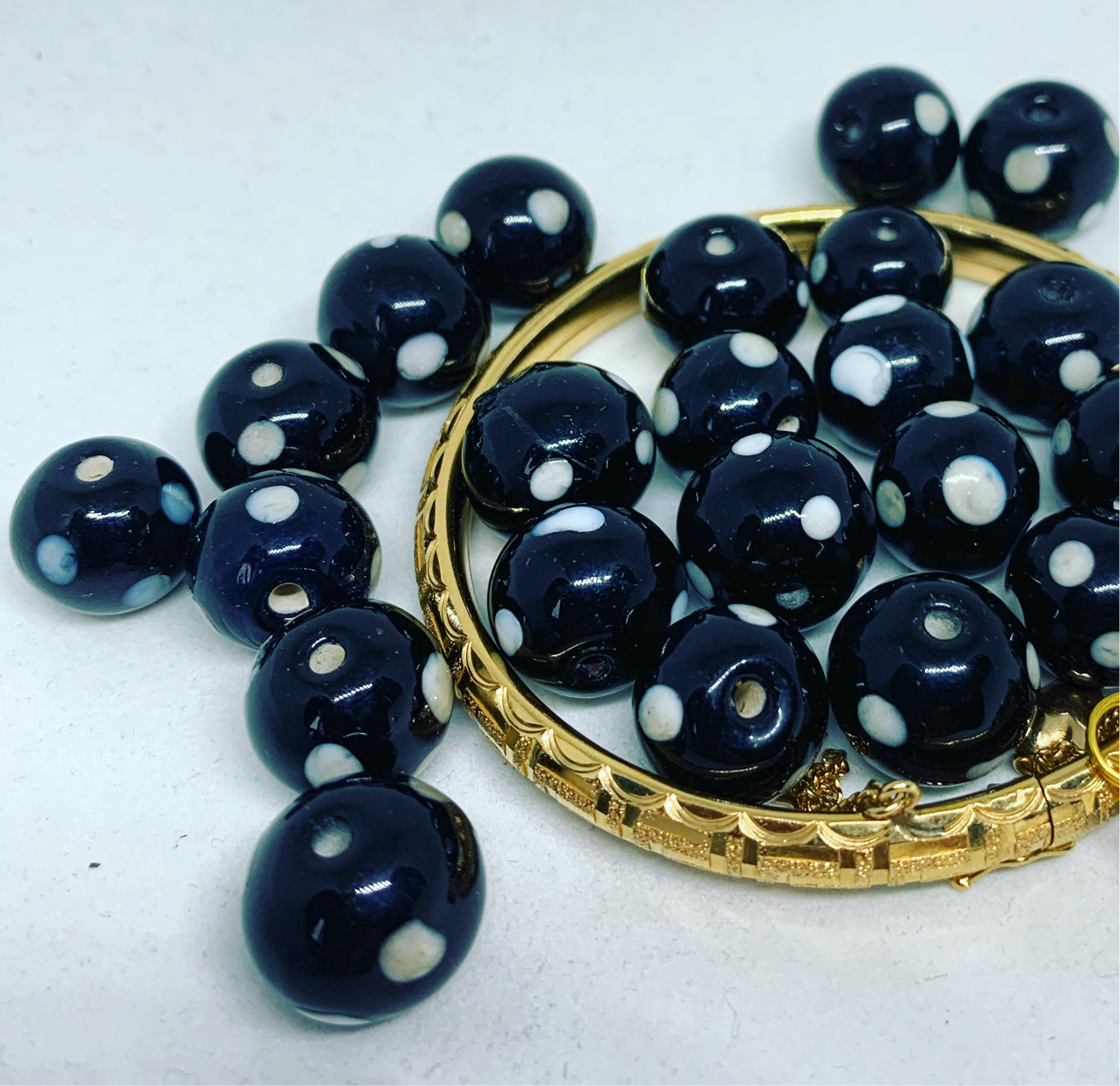 Conta di Ojo Beads