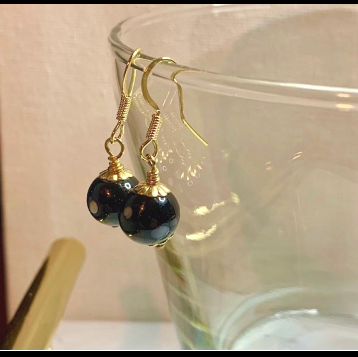 Conta di Ojo Earrings